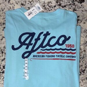 AFTCO Light Blue T-Shirt with Red and Navy Design